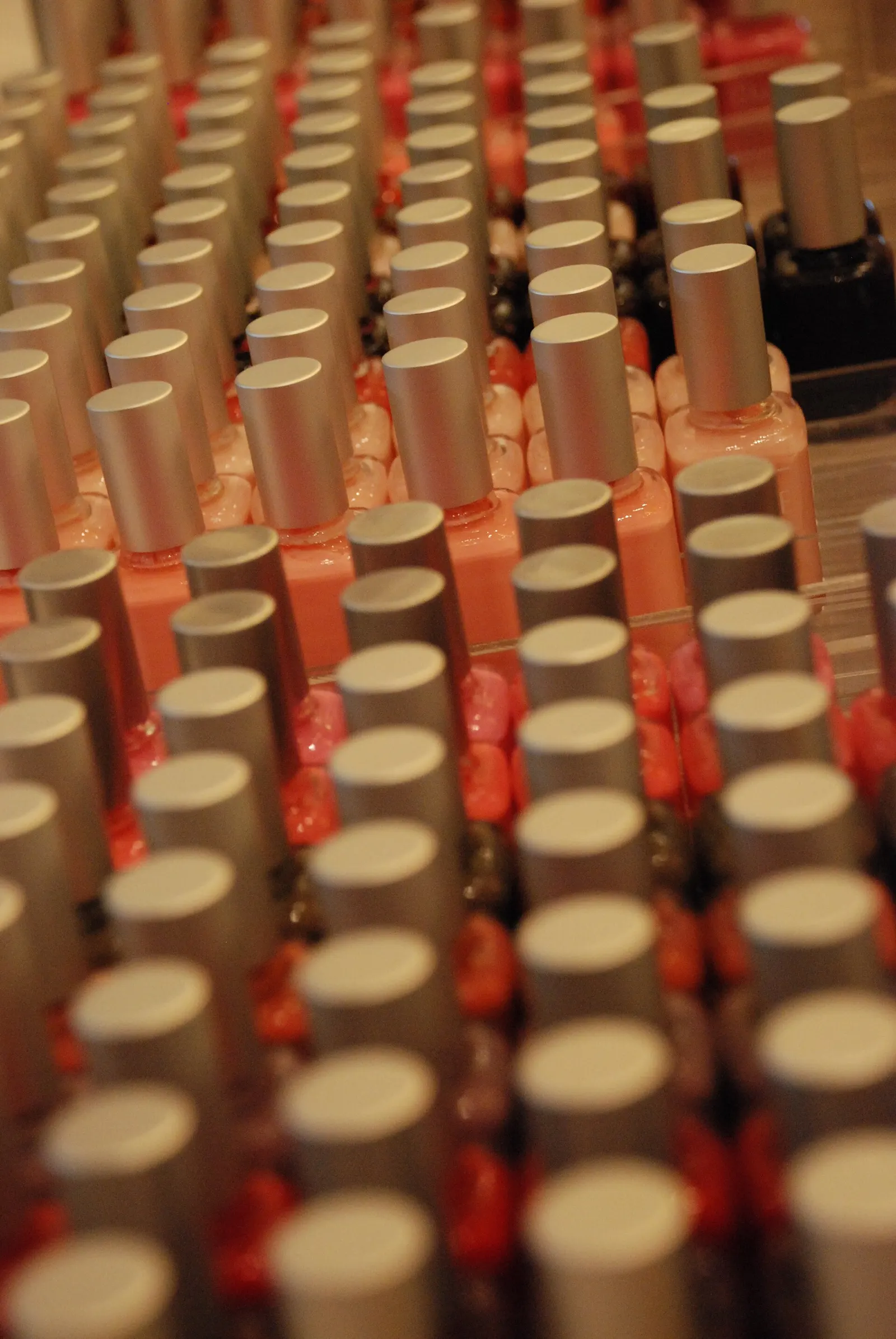 Rows of nail polish bottles